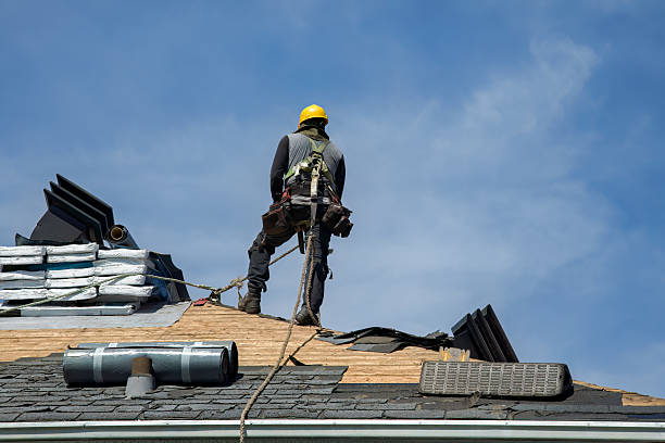 Professional Roofing technician working in North Waltham, MA